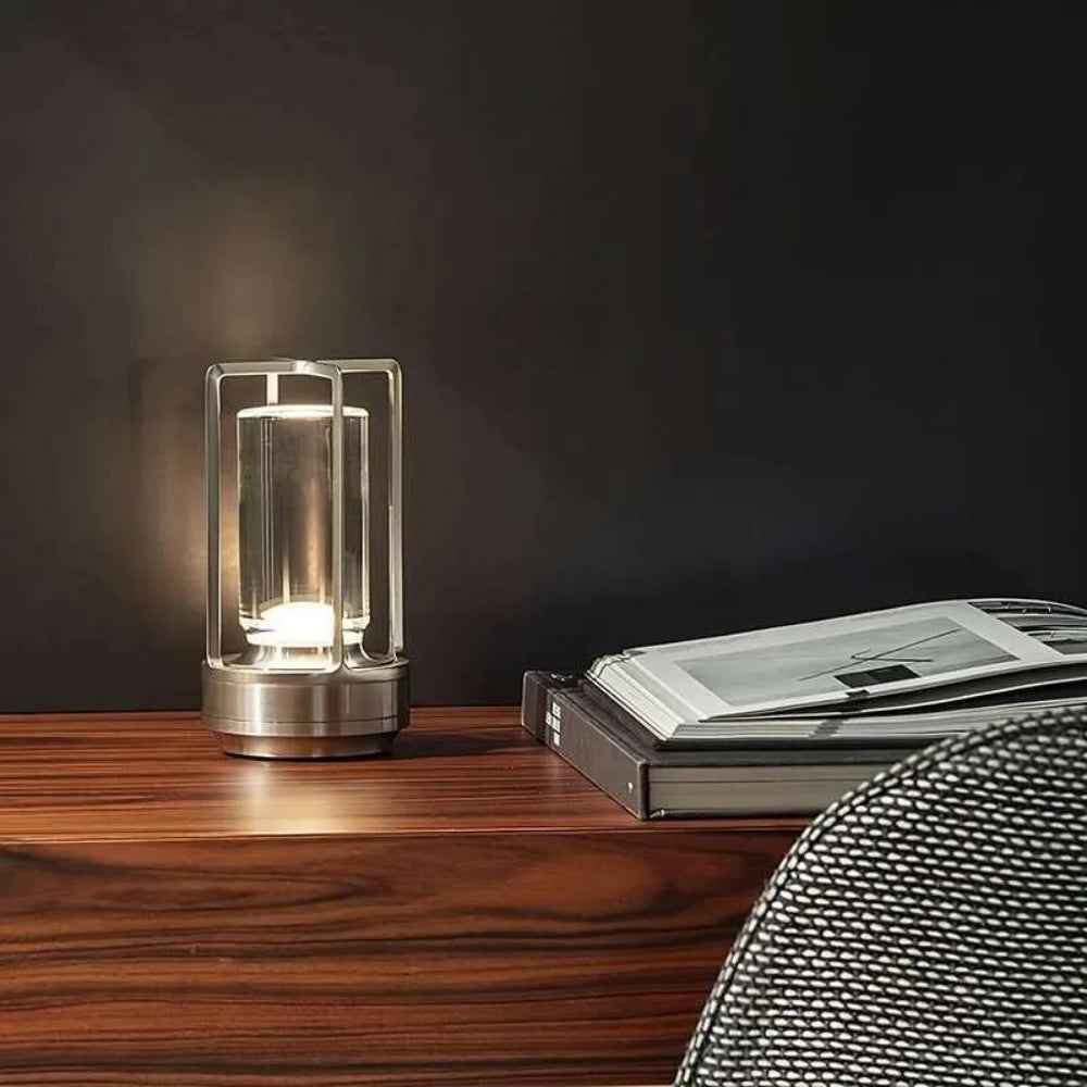 Nordic style crystal table lantern with a brushed metal base and a warm ambient glow.