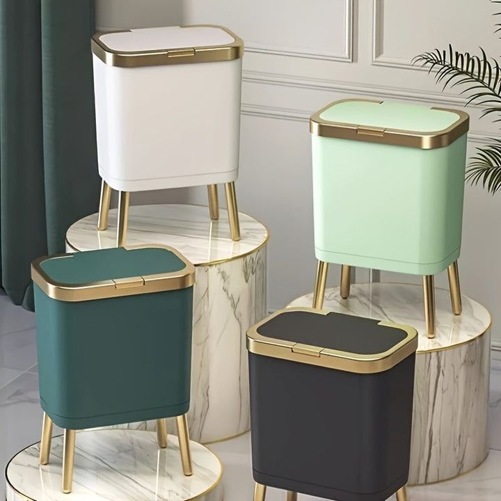 Four 15L elevated trash cans in white, mint green, dark green, and black, each with gold legs and trim.