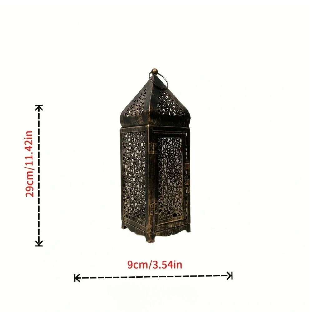 A tall, antique-style iron lantern with intricate cut-out patterns and a pointed top.