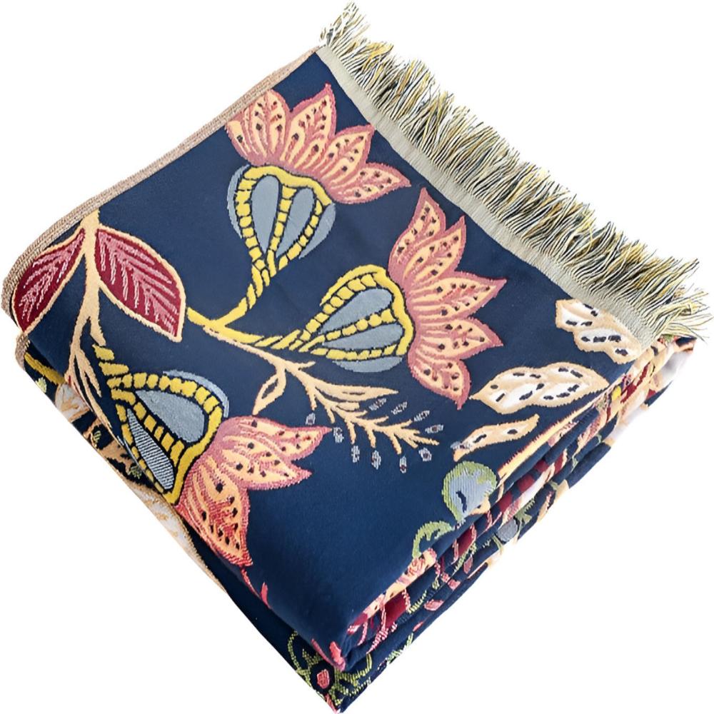 Navy blue cotton towel with a vibrant floral pattern in pink, yellow, and blue, featuring fringed edges.