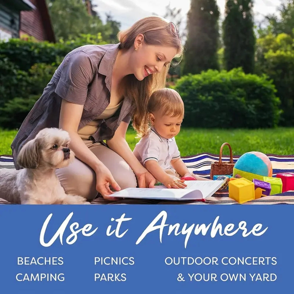 Woman and child with dog on a picnic mat, with text "Use it Anywhere: Beaches, Camping, Picnics, Parks, Outdoor Concerts &amp; Your Own Yard."