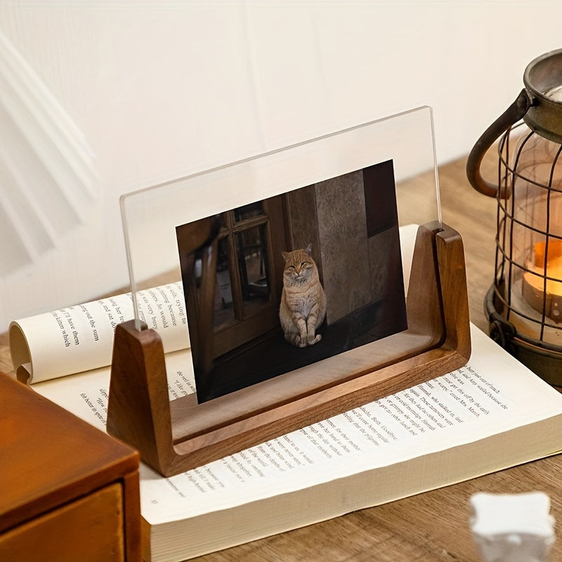 U-Shaped photo frame made of wood and clear acrylic displaying a cat picture.