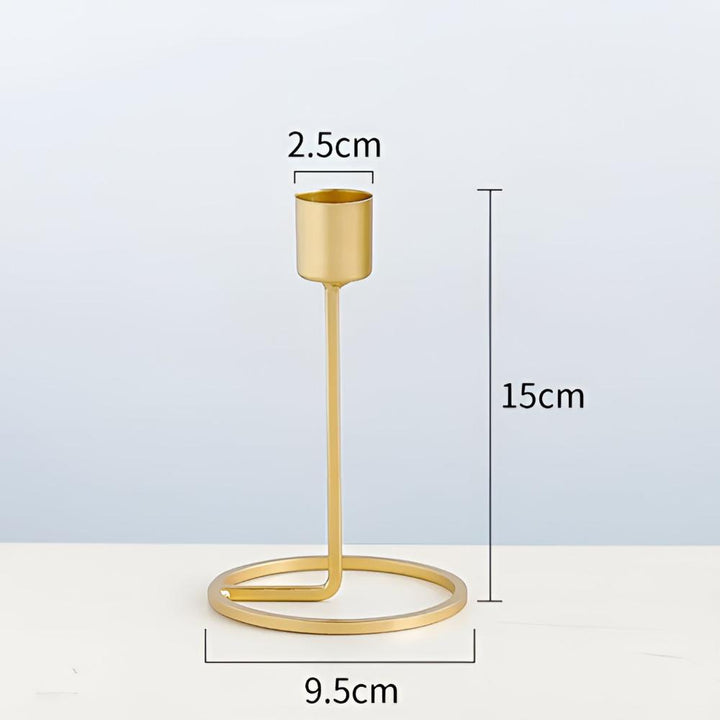 Golden boho candle holder with a circular base and a tall stem, measuring 15cm in height.