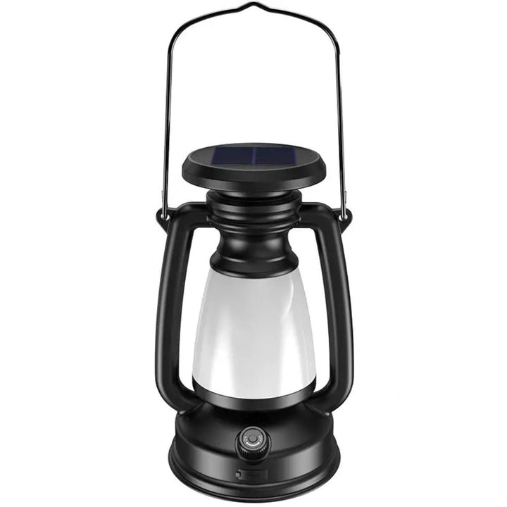 Black solar camping lantern with a white frosted globe and a metal handle.