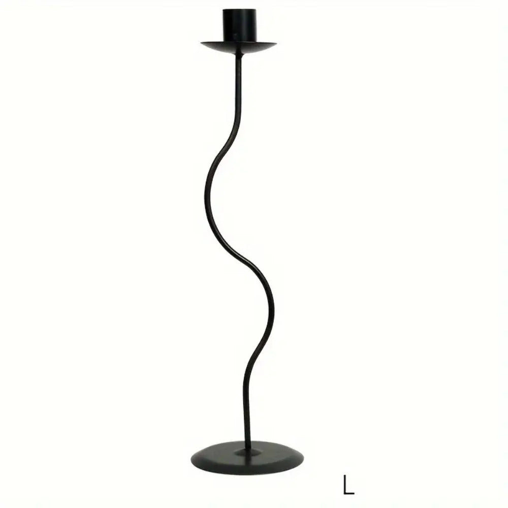 Black wavy iron candle holder with a round base and a top holder for a candle.