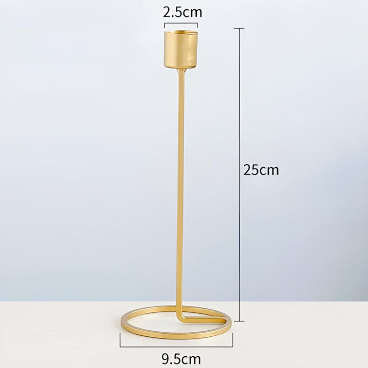 Golden boho candle holder with a circular base and a tall stem, measuring 25cm in height.