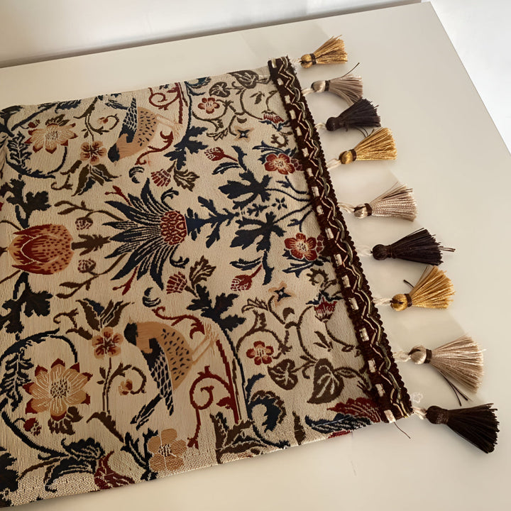 Vintage floral and bird jacquard table runner with tassels.