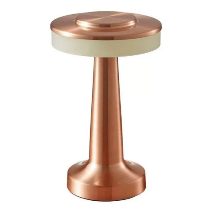 Copper Dome cordless table lamp with a warm ambient glow and a touch control top.
