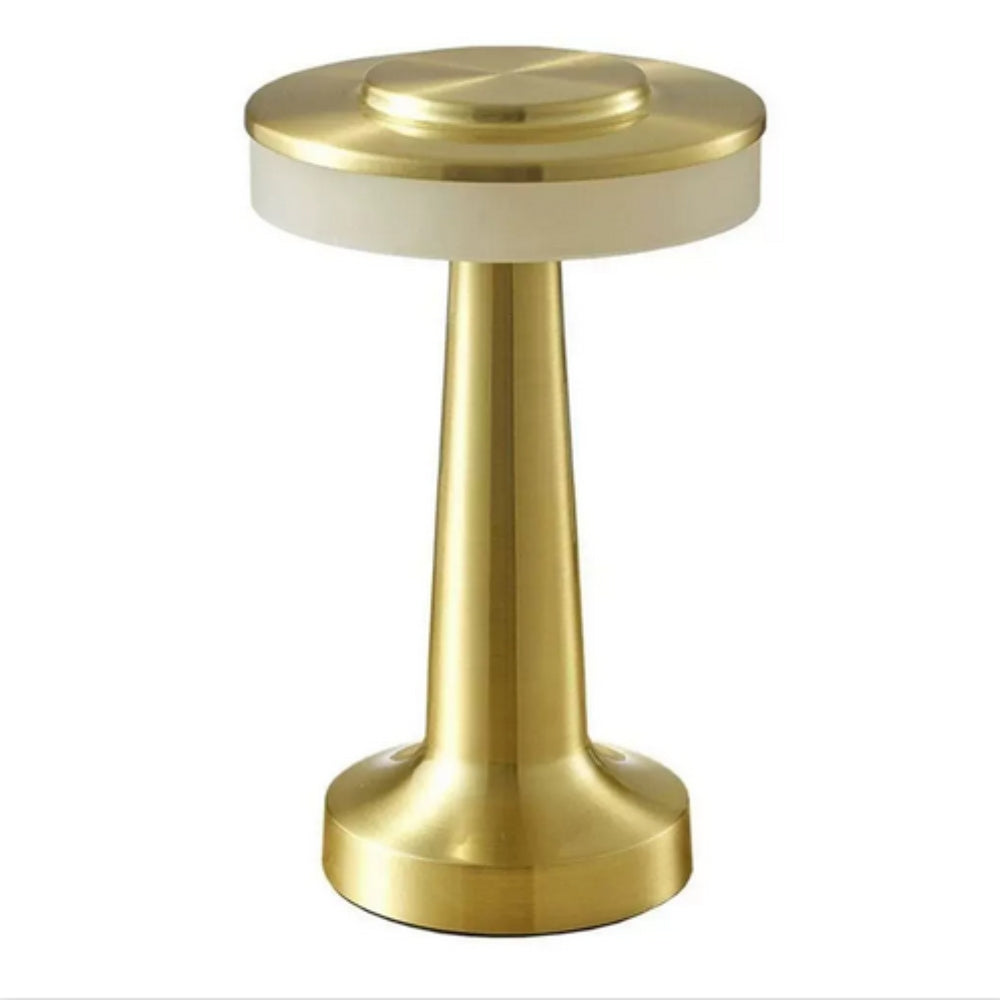 Brass cordless table lamp with a dome-shaped shade and a tapered base.