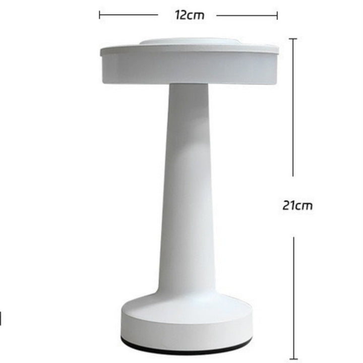 White cordless dome table lamp, 21cm tall and 12cm wide.