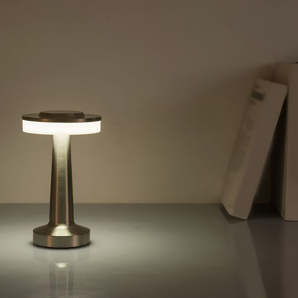 Dome Cordless Table Lamp with a metallic finish and warm ambient glow.