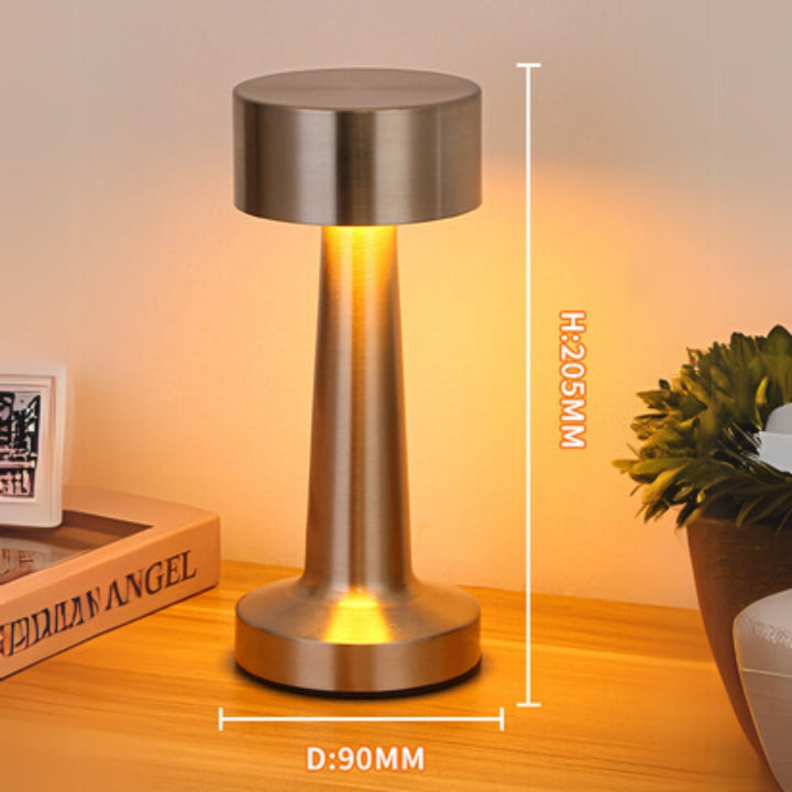 Portable LED desk lamp made of aluminum, with dimensions H:205MM and D:90MM.