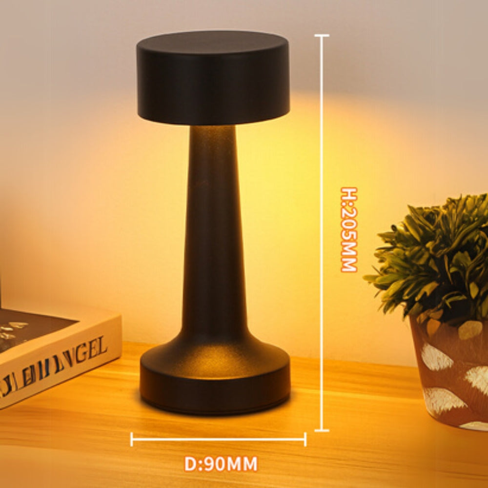 Black portable LED desk lamp with dimensions H:205MM and D:90MM.