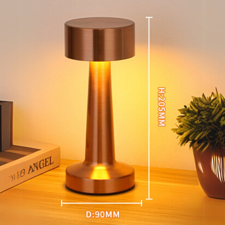 Copper portable LED desk lamp, 205mm high and 90mm in diameter.