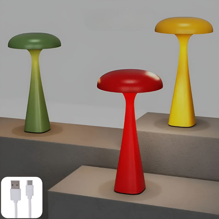 Three mushroom-shaped desk lamps in green, red, and yellow, with a USB charging cable icon.