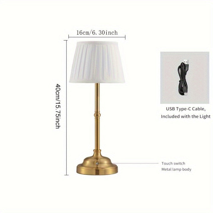 Brass table lamp with pleated white shade, 40cm height, 16cm width. Includes USB Type-C cable.