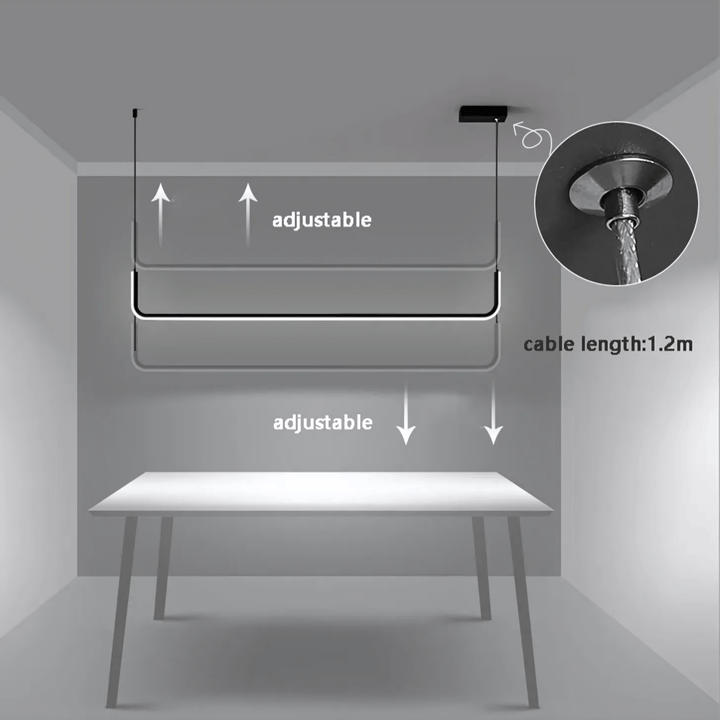 Modern adjustable pendant light with a 1.2m cable length, shown above a table.