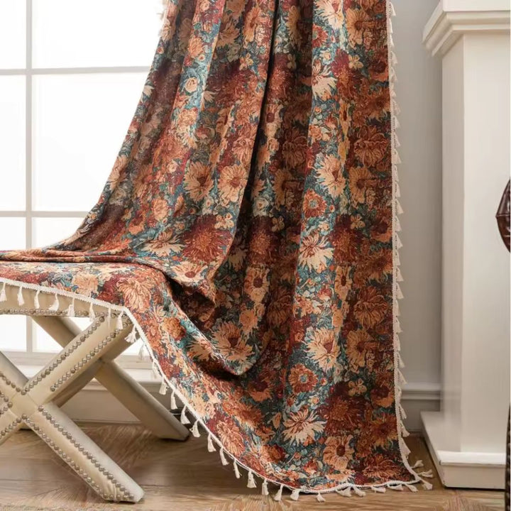 French Vintage Floral Tapestry Curtain with tassels draped over a bench.