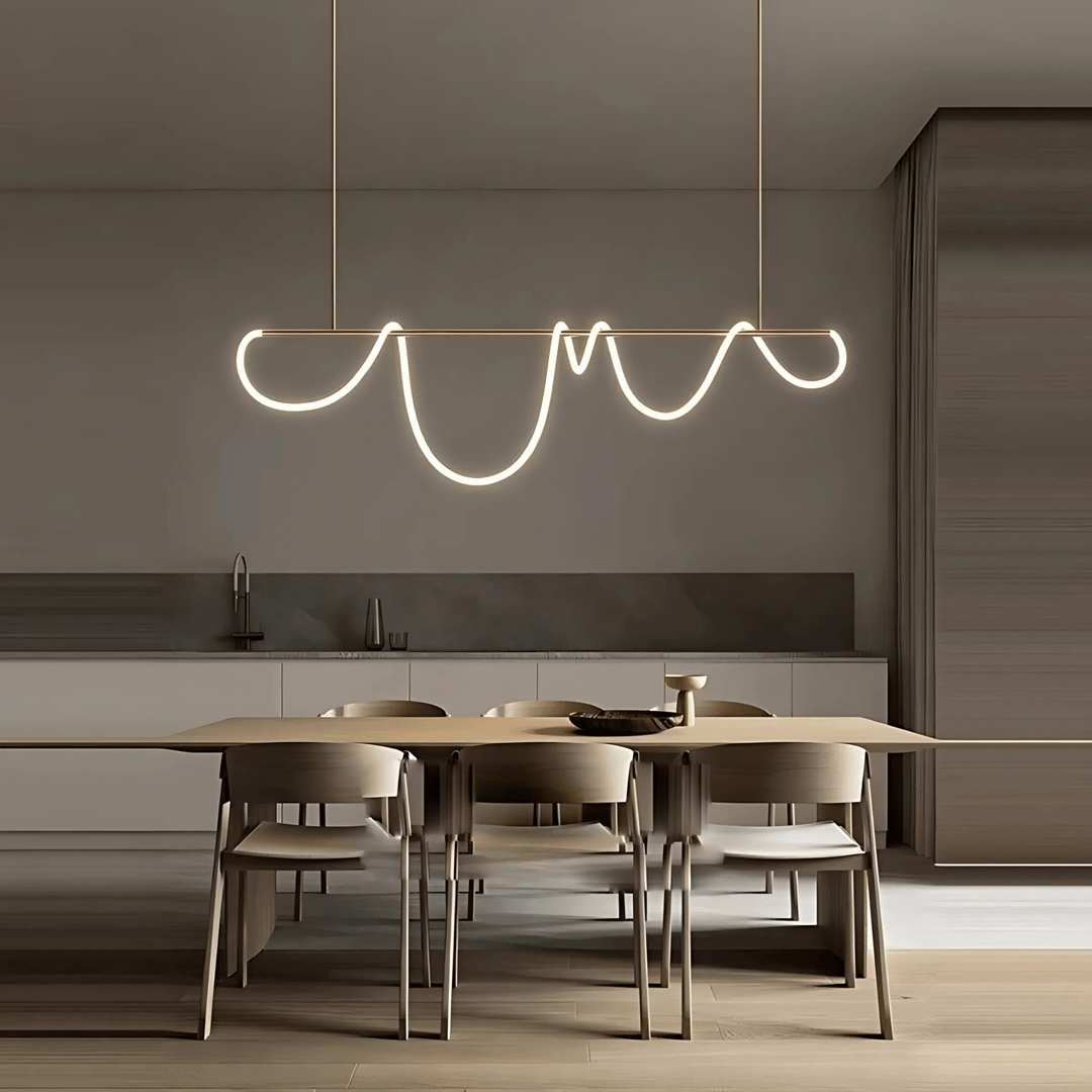 Modern black chandelier with a wavy silicone LED rope hanging over a dining table.
