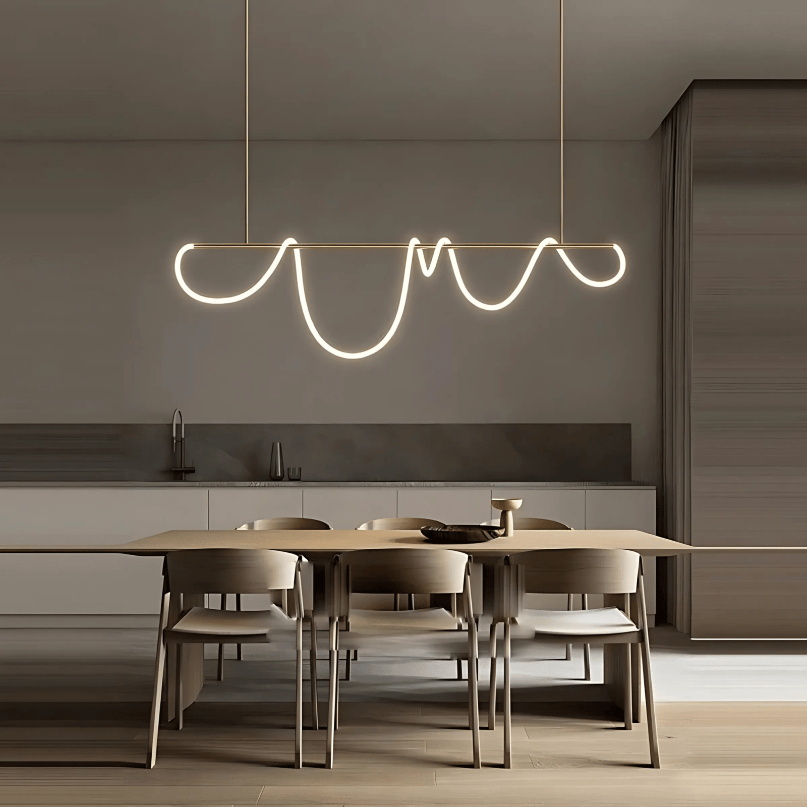 Modern black chandelier with a wavy silicone LED rope hanging over a dining table.