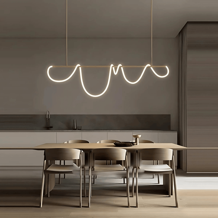Modern black chandelier with a wavy silicone LED rope hanging over a dining table.