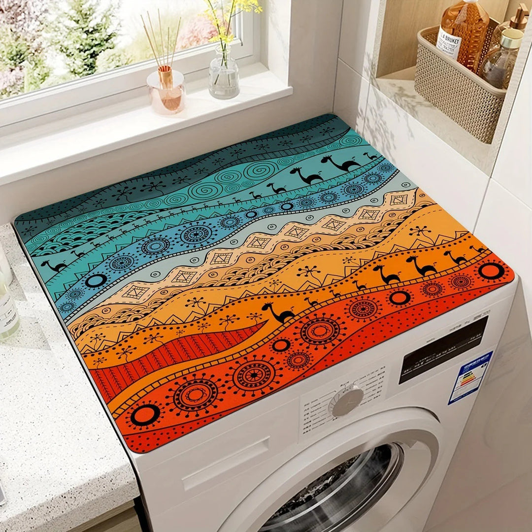 Microfiber appliance mat with a colorful tribal pattern featuring giraffes and geometric designs.
