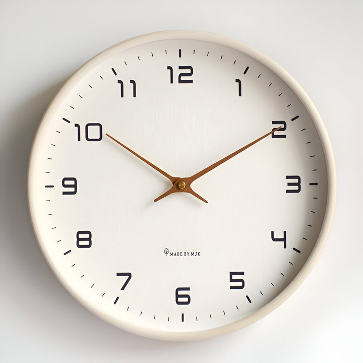 Nordic Wood Wall Clock with a white face, black numbers, and wooden hands.