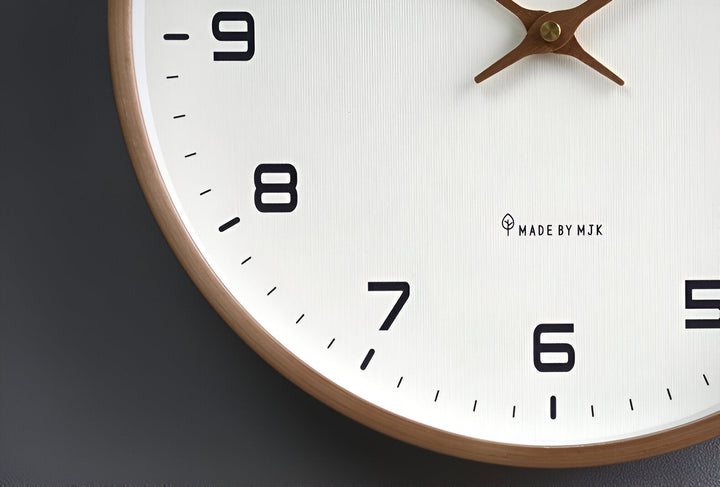Nordic Wood Wall Clock with minimalist design, featuring black numerals on a white face and a warm wood frame.