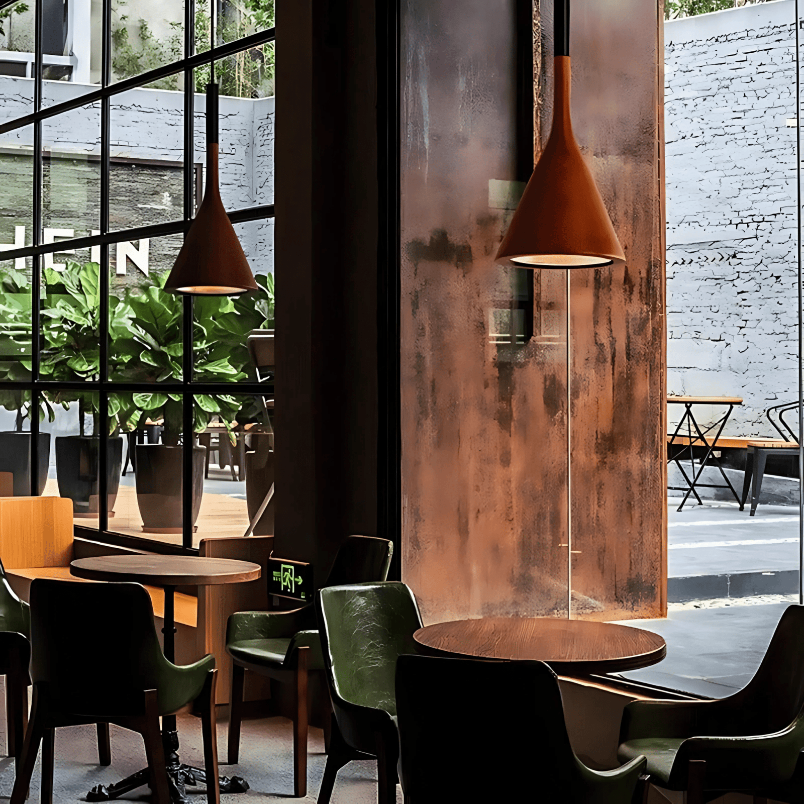 Modern cone pendant light in a warm, earthy tone, hanging in a cafe setting.