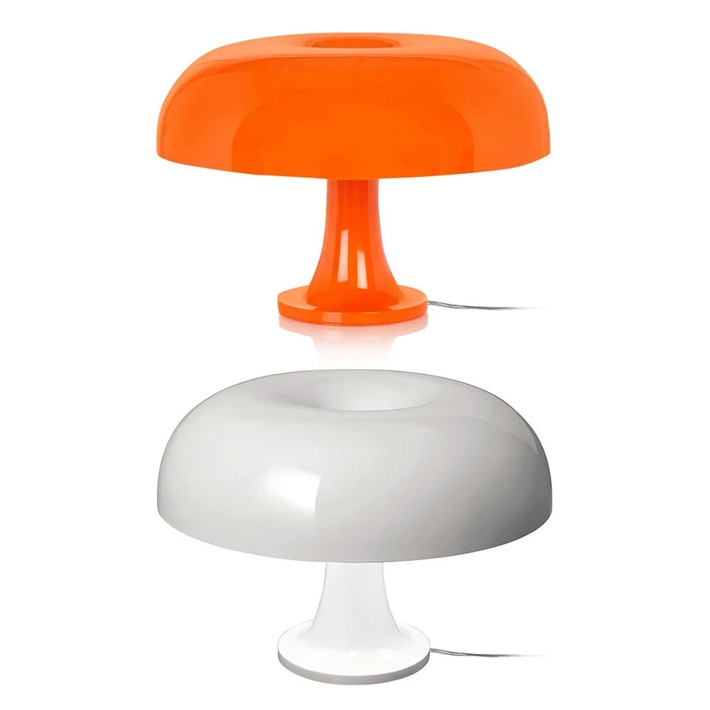 Orange and white mushroom-shaped LED table lamps on a white background.