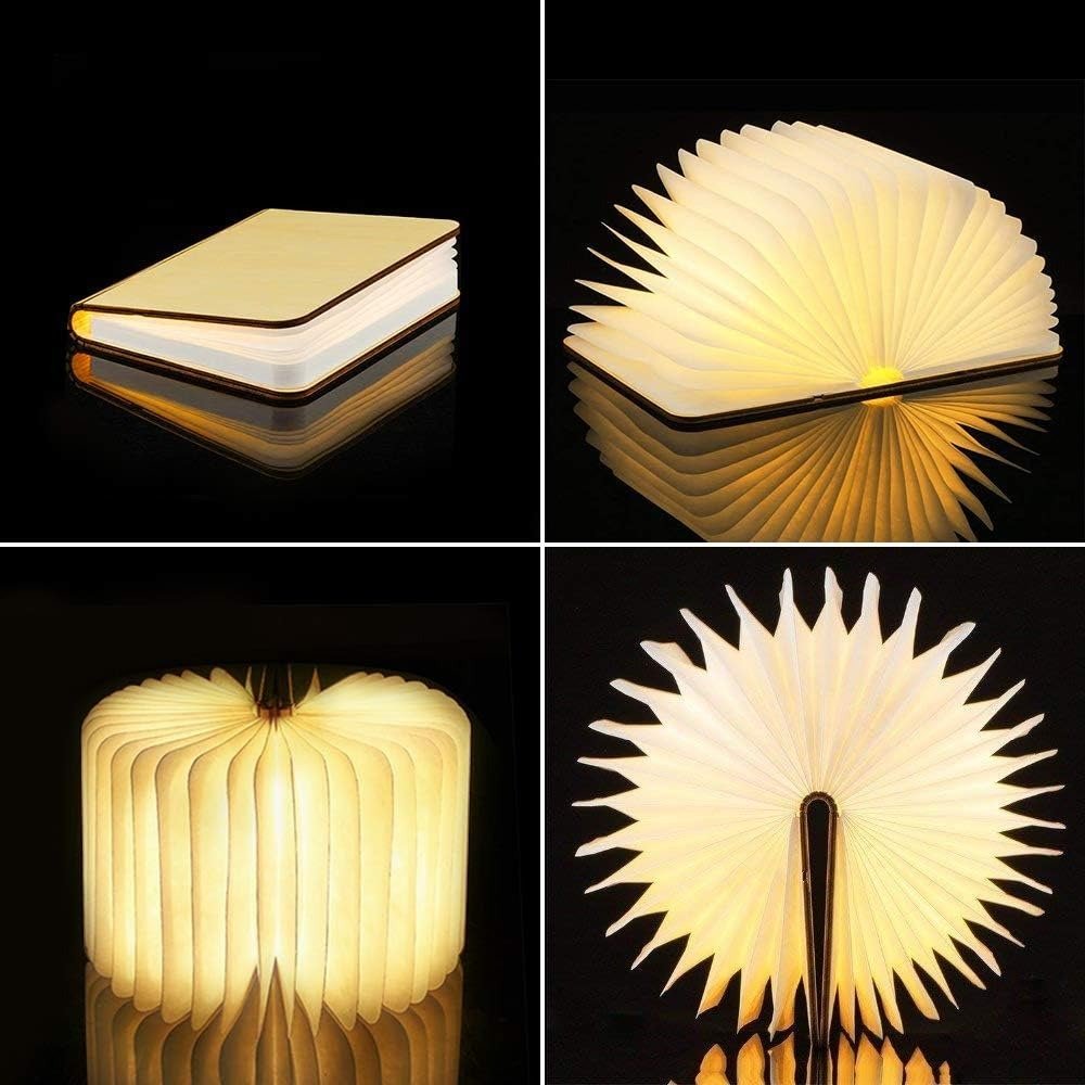 Foldable book lamp with warm light, shown closed, open to a fan shape, and open to a cylinder.