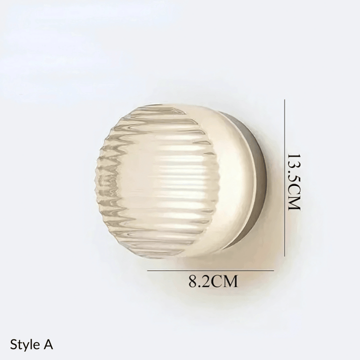 Style A metal and glass wall sconce, 8.2cm wide and 13.5cm high.