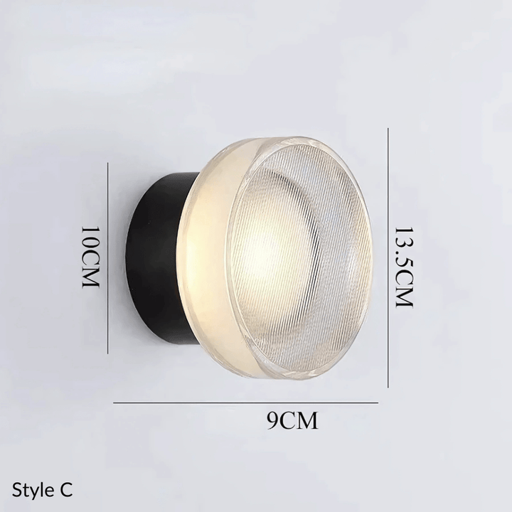 Style C metal and glass wall sconce, 10cm height, 13.5cm width, 9cm depth.