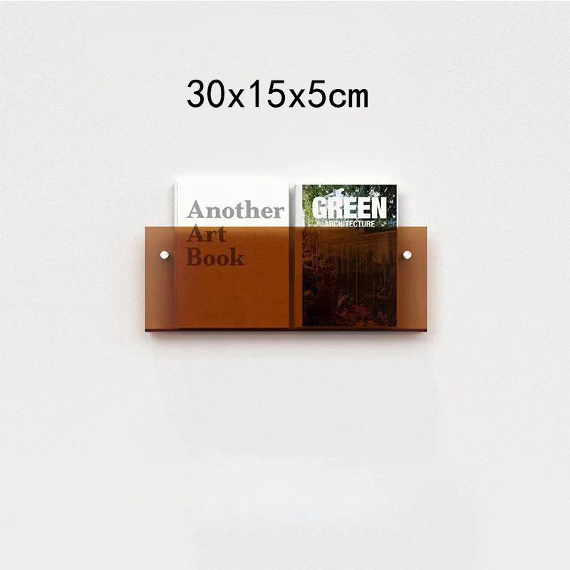 Brown acrylic floating shelf holding two books, one titled &