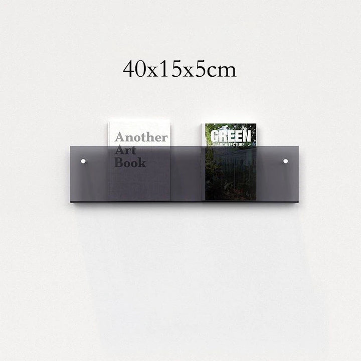 A 40x15x5cm clear acrylic floating shelf mounted on a white wall, holding two books.