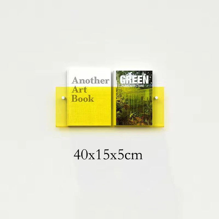 Yellow acrylic floating shelf holding two books: &