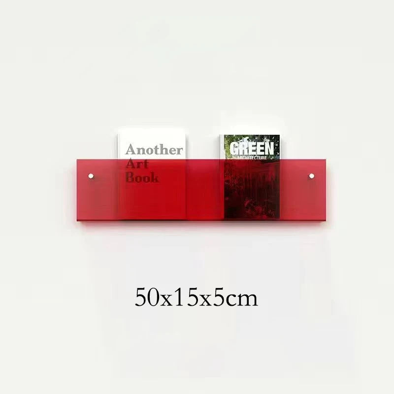 Red acrylic floating shelf holding two books, one titled &