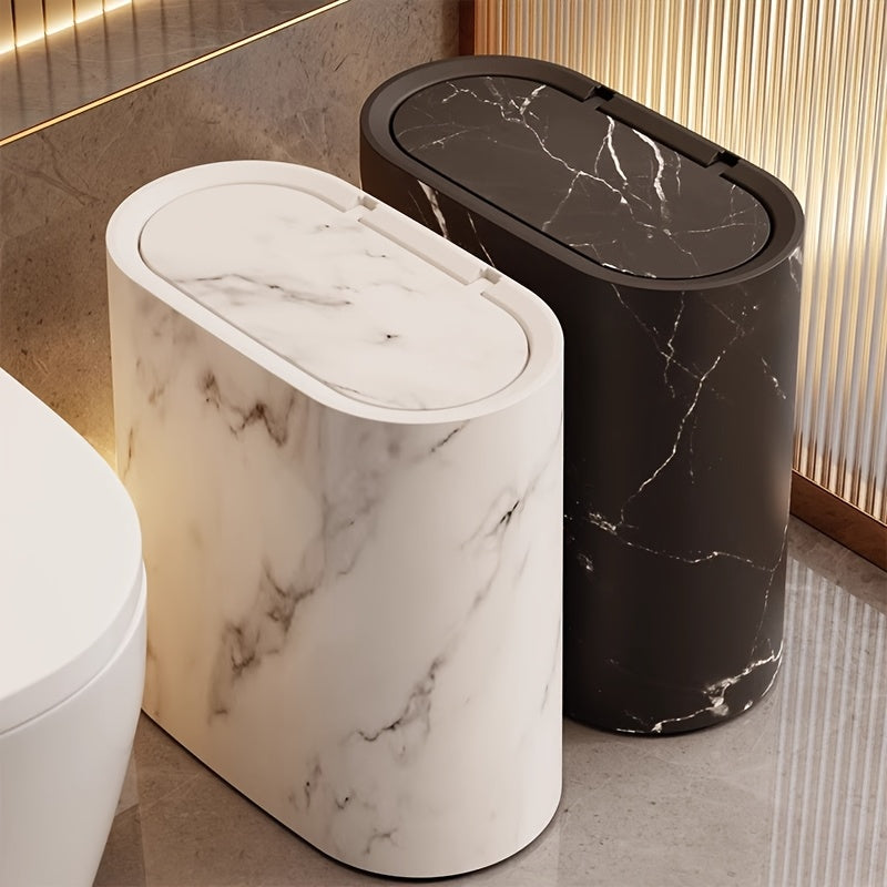 Two modern marble trash cans, one white and one black, with oval lids.