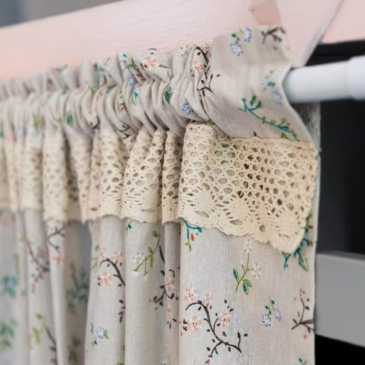 Nordic Bloom kitchen curtain with floral pattern and lace trim.