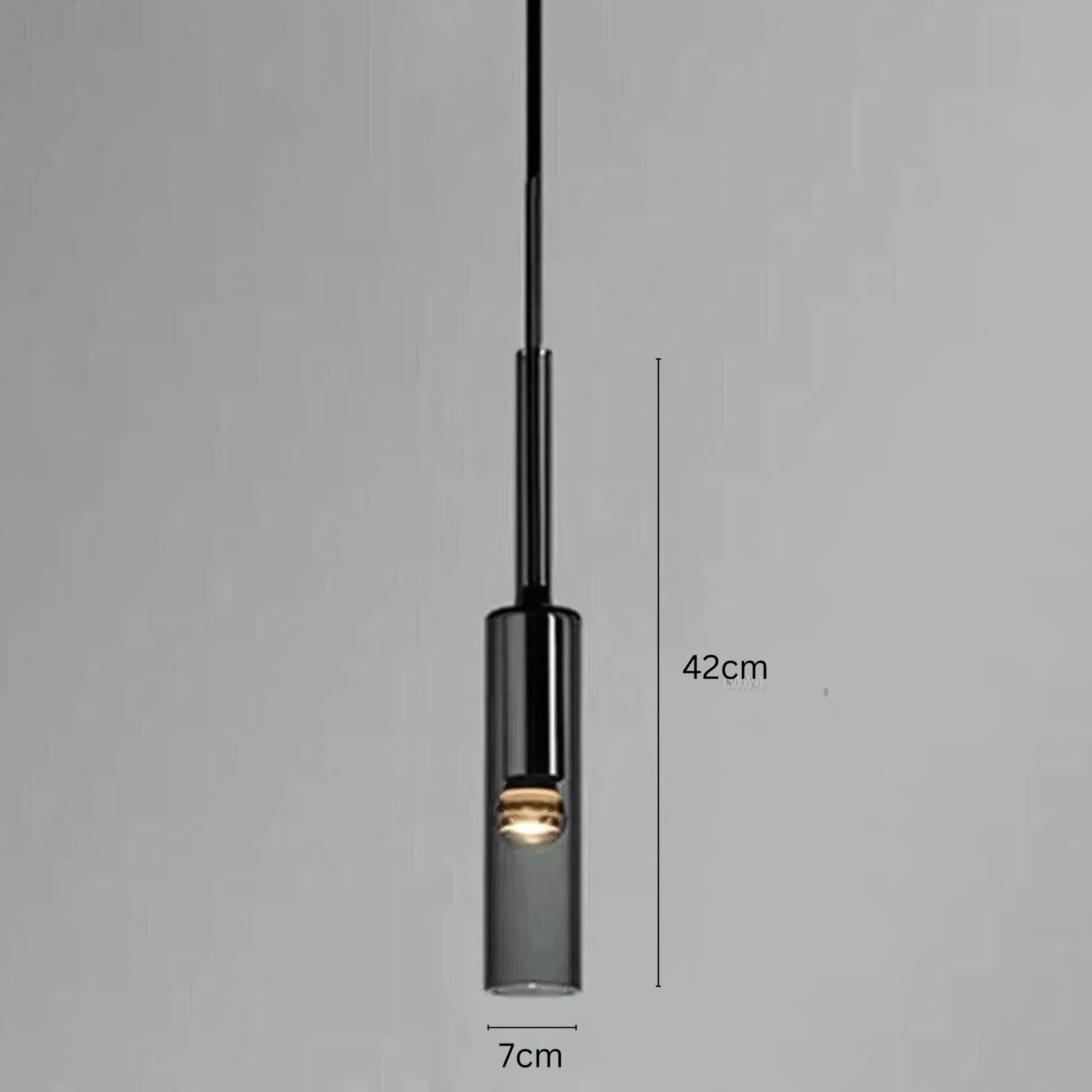 Black glass pendant light with a 42cm length and 7cm width.