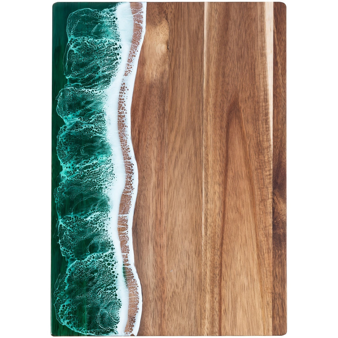 Acacia wood cutting board with a green and white resin wave design along the left edge.