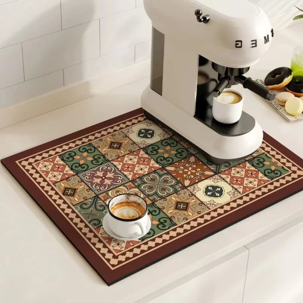 Retro tile coffee mat with a coffee machine and cup on it.