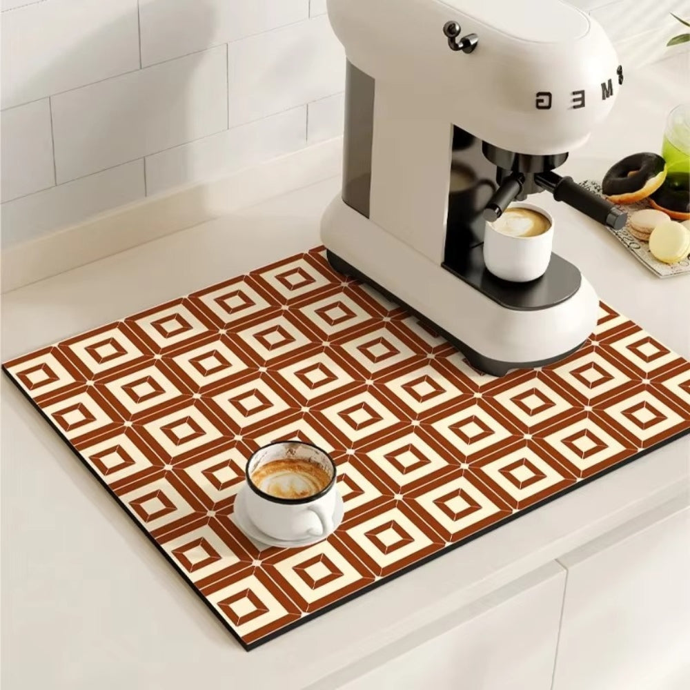Retro tile coffee mat with a coffee maker and cup on it.