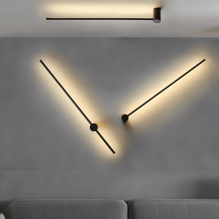 Black satin wall sconce with two light bars resembling clock hands.