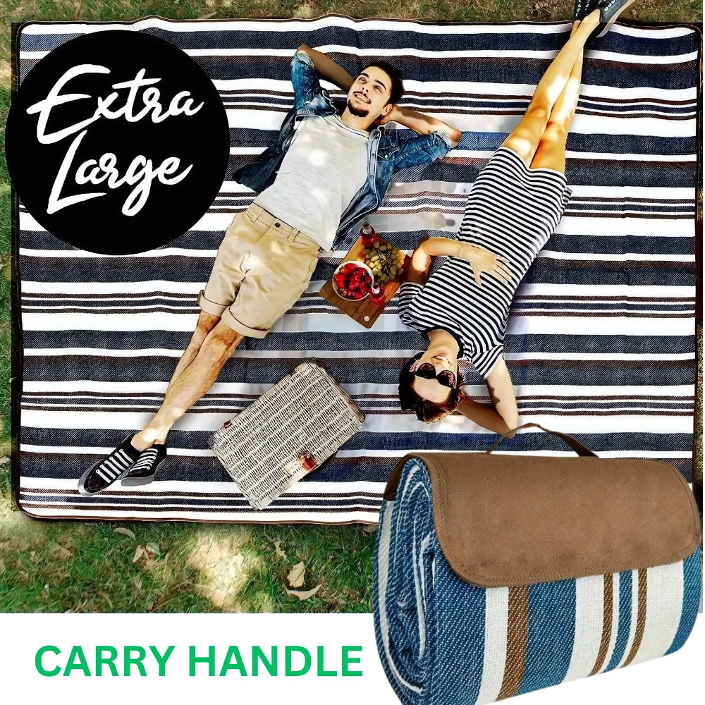 Extra large waterproof picnic mat with a carry handle, shown with a couple enjoying a picnic.
