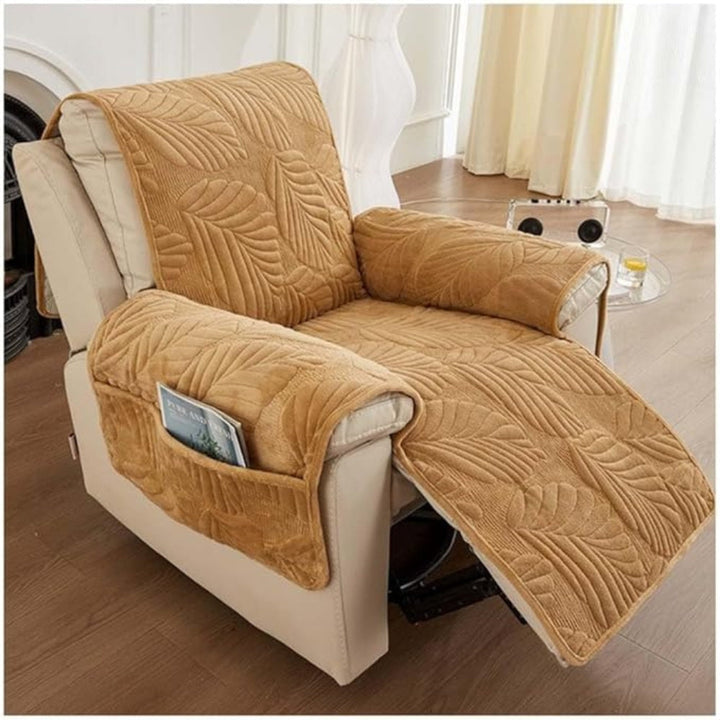 Tan recliner chair cover with a leaf pattern and side pocket.