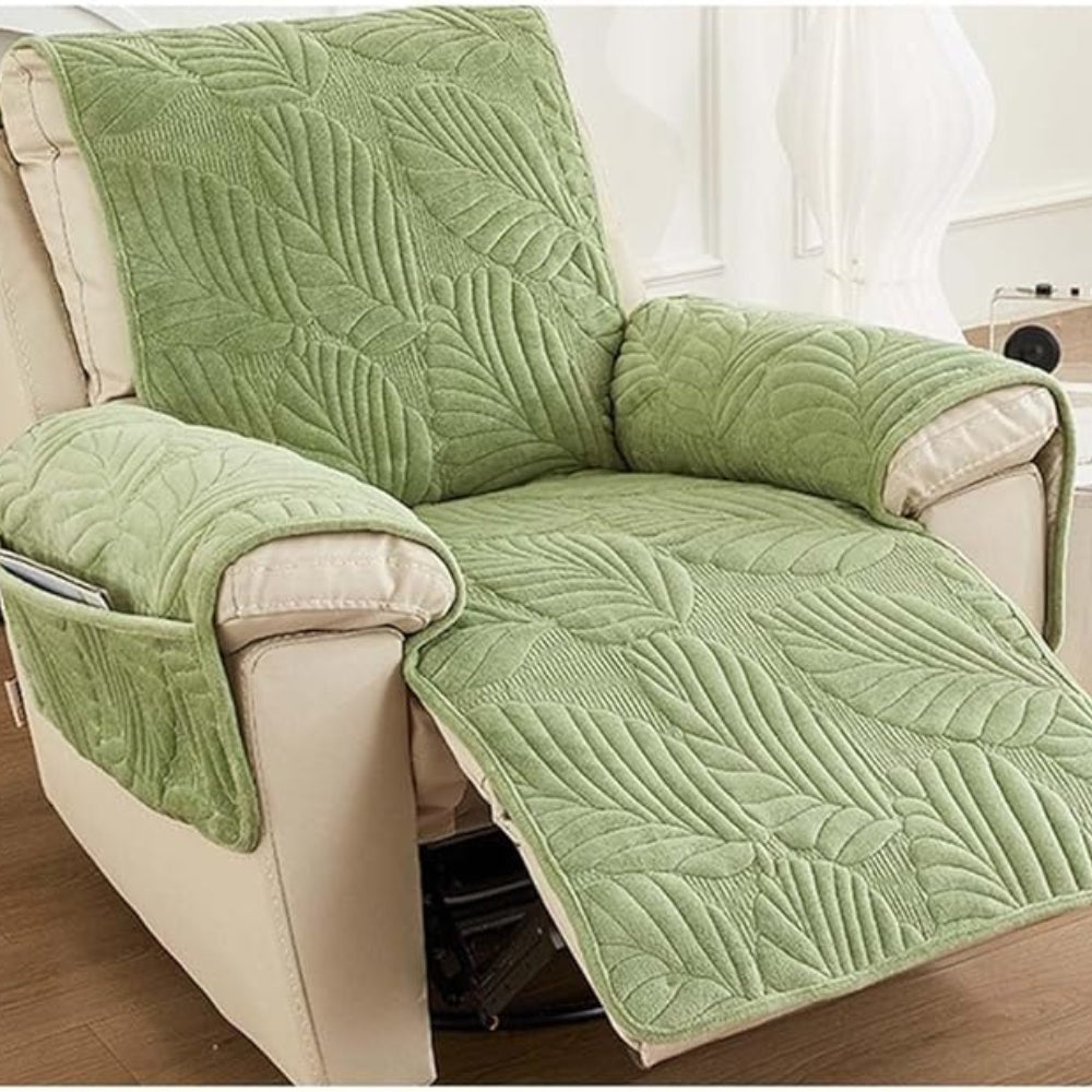 Light green recliner chair cover with a quilted leaf pattern and side pockets.