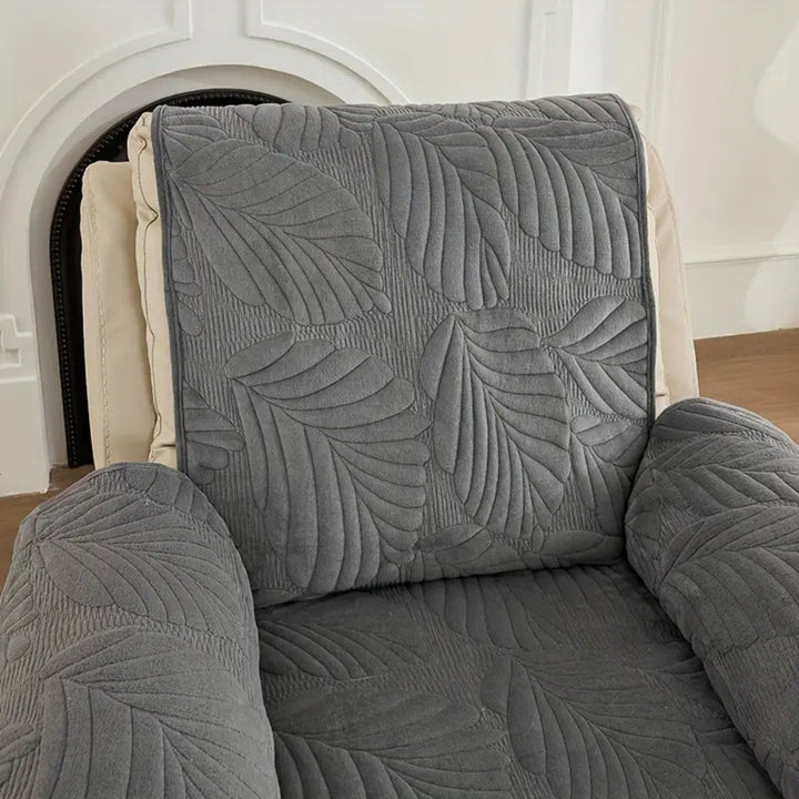 Gray recliner chair cover with a textured leaf pattern.