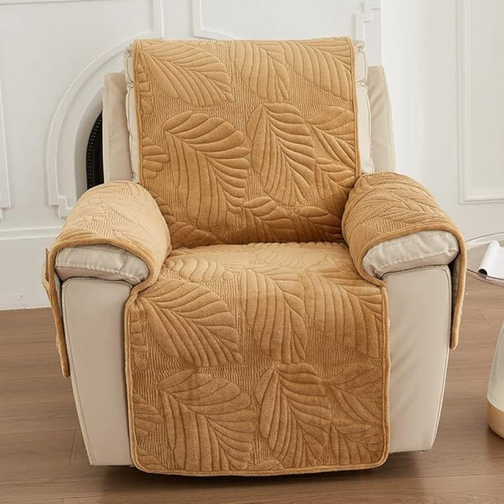 Tan recliner chair cover with embossed leaf pattern and arm covers.
