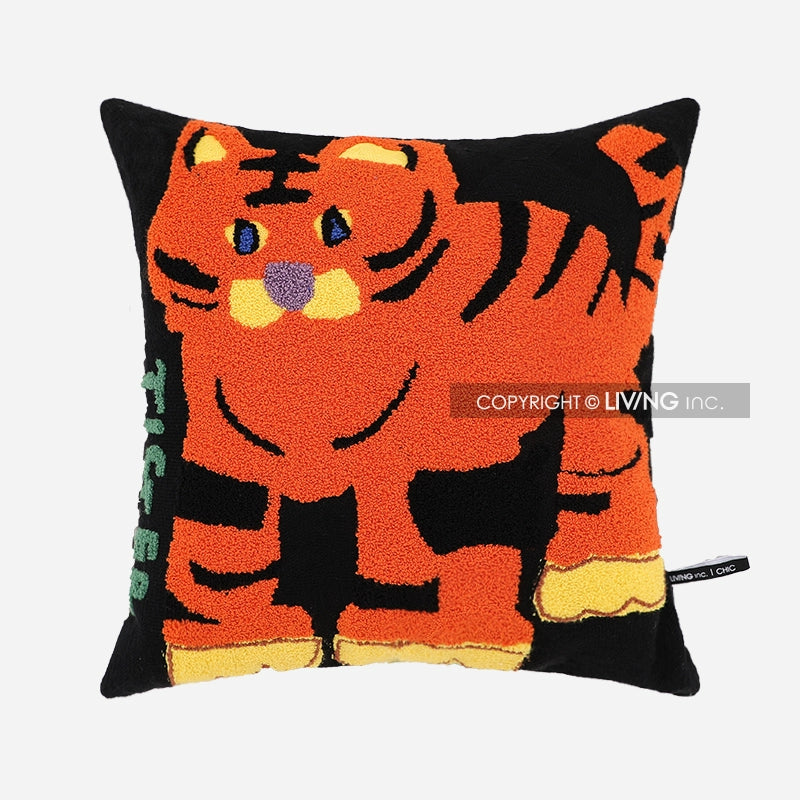 Black throw pillow with a cartoon tiger design in orange, yellow, and black.